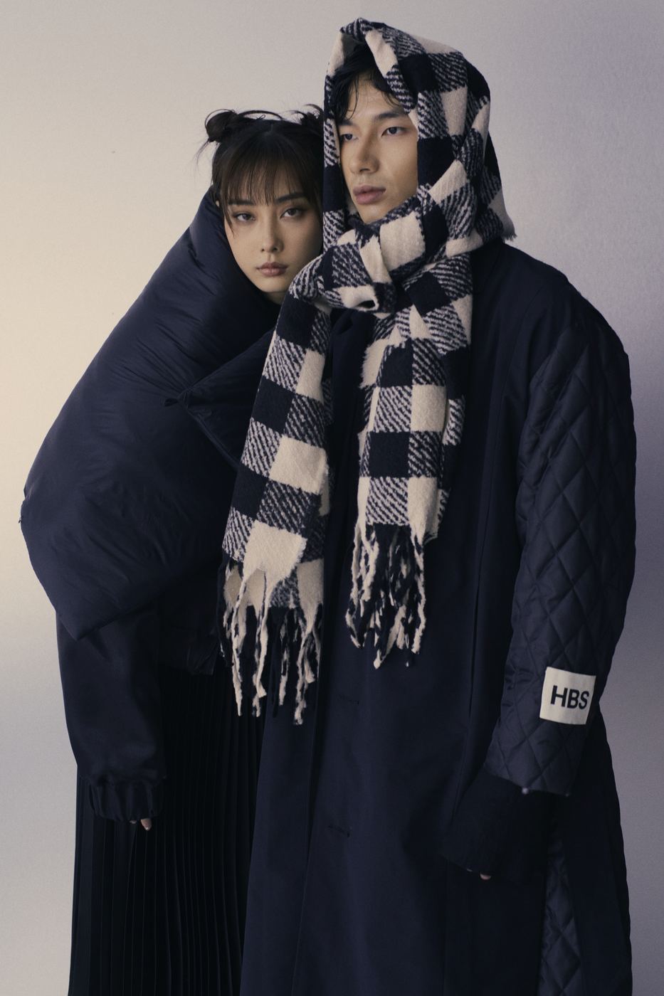 Sharing one checked scarf