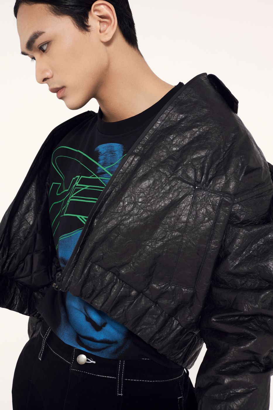 Leather jacket falling off the shoulder