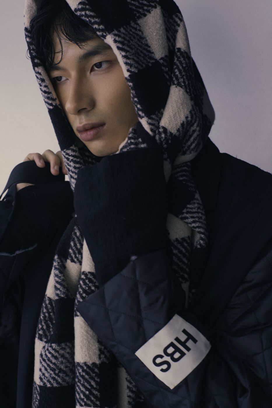 Checked scarf and an upside-down HBS label