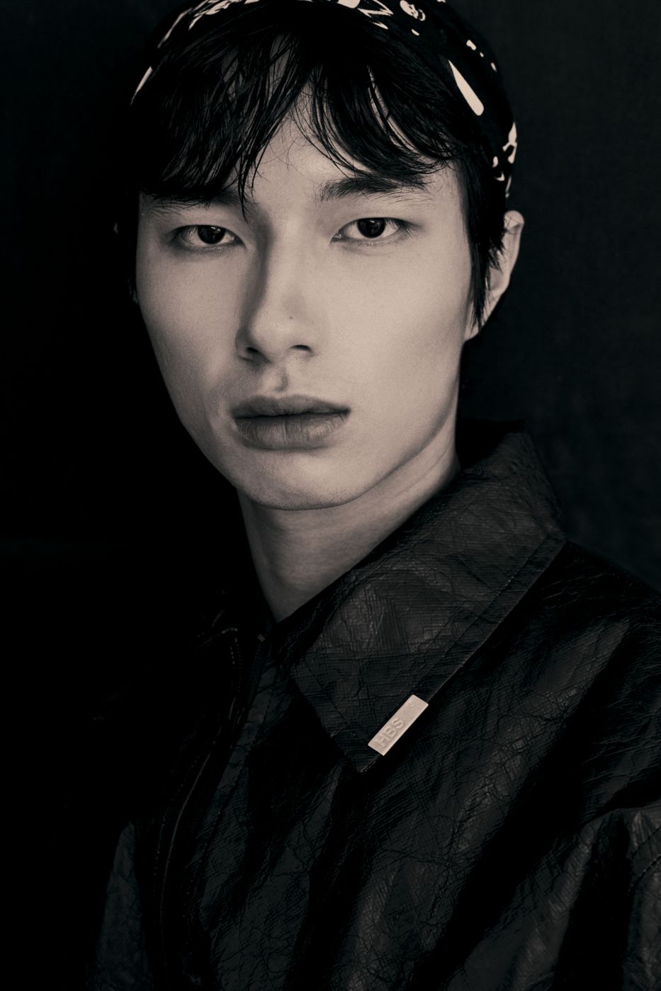 Black and white portrait, leather collar
